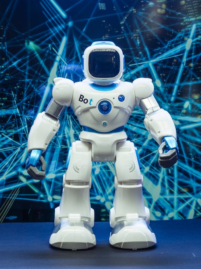 get-in-touch Futuristic humanoid robot against a blue network pattern backdrop, showcasing modern technology.